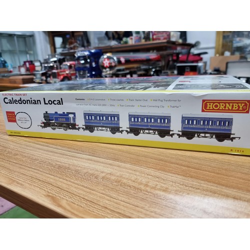 2 - A boxed as new Hornby R1016 Caledonian local train set, never had any use.