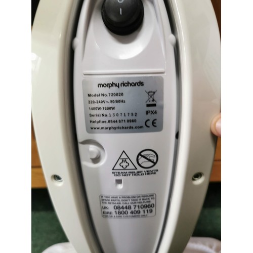 106 - Morphy Richards 9 in 1 Steam Cleaner in good condition complete with accessories