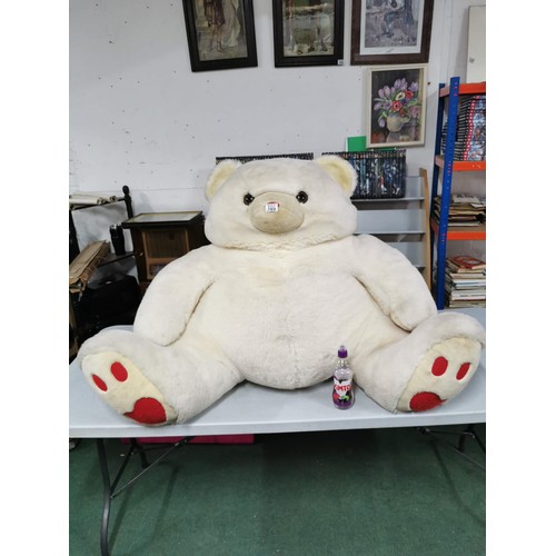 109 - Very large cream teddy bear in good overall condition height 81cm by 112cm