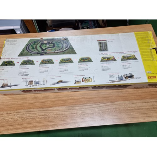 8 - A boxed unused Hornby R1089 the Anglian train set, box is a little tatty but the set inside is in un... 