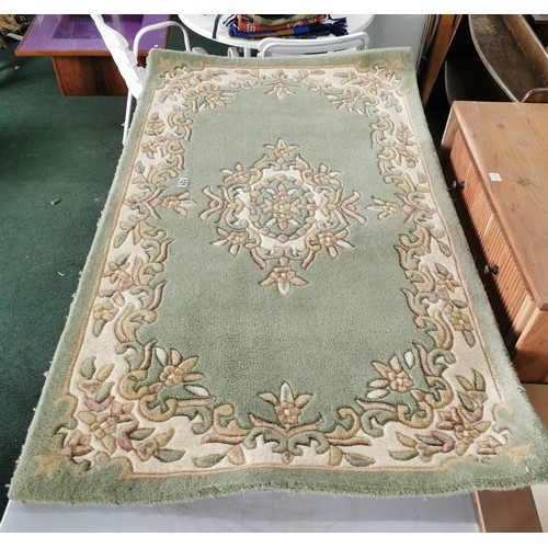 121 - Very clean wool pile Firth rug in good order measuring 152cm long and 91cm wide