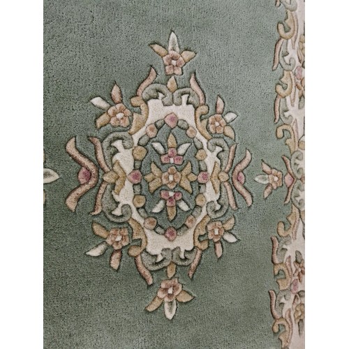 121 - Very clean wool pile Firth rug in good order measuring 152cm long and 91cm wide