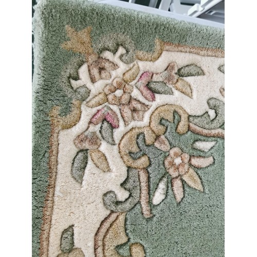 121 - Very clean wool pile Firth rug in good order measuring 152cm long and 91cm wide