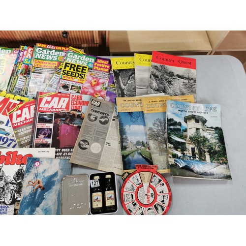 127 - A quantity of car and bike related magazines including Autocar, popular motoring, along with a quant... 