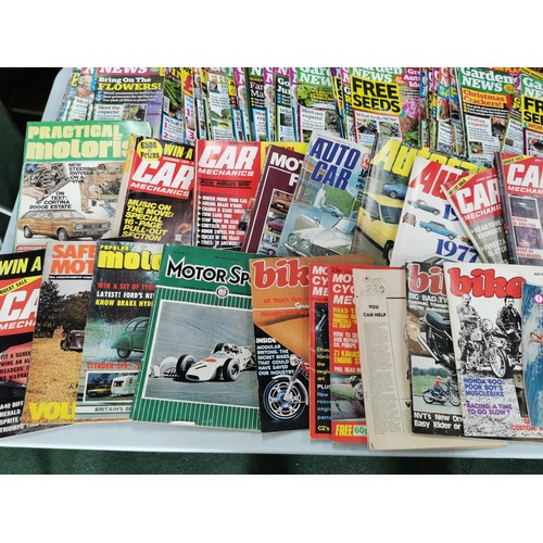 127 - A quantity of car and bike related magazines including Autocar, popular motoring, along with a quant... 