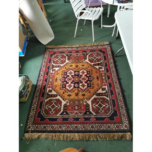 132 - Good Quality Handmade aztec style woven hand knotted rug in good order 170cm long 130cm wide