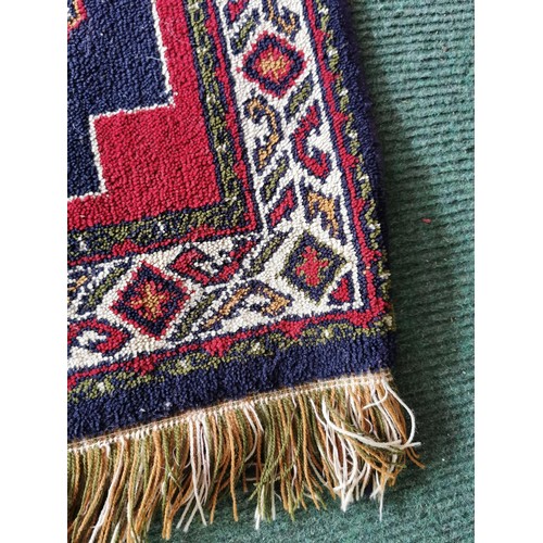 132 - Good Quality Handmade aztec style woven hand knotted rug in good order 170cm long 130cm wide