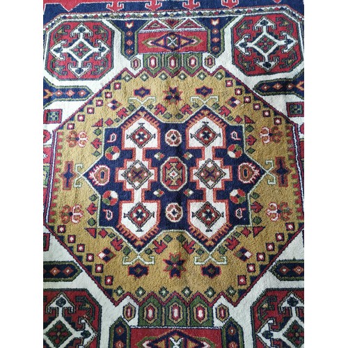 132 - Good Quality Handmade aztec style woven hand knotted rug in good order 170cm long 130cm wide