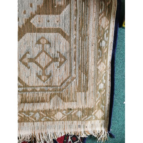 132 - Good Quality Handmade aztec style woven hand knotted rug in good order 170cm long 130cm wide