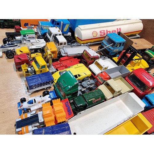 20 - A large quantity of various vintage diecast vehicles including cars and lorries, with good brand nam... 