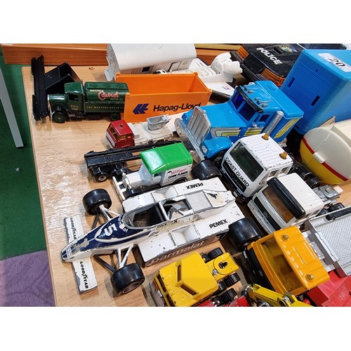 20 - A large quantity of various vintage diecast vehicles including cars and lorries, with good brand nam... 