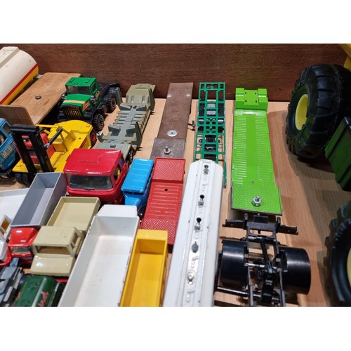 20 - A large quantity of various vintage diecast vehicles including cars and lorries, with good brand nam... 