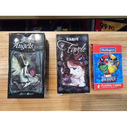 22 - A large collection of 22x as new boxed tarot cards and playing cards to include 7 large tarot card s... 