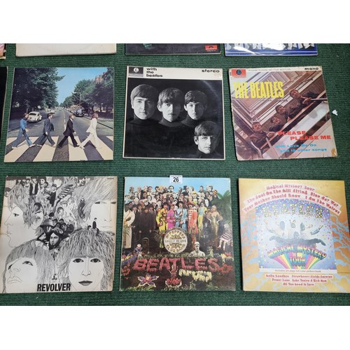 26 - A large collection of 16x vintage LP vinyl records all relating to The Beatles. To include 12 offici... 