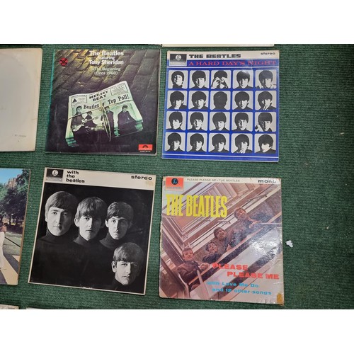 26 - A large collection of 16x vintage LP vinyl records all relating to The Beatles. To include 12 offici... 