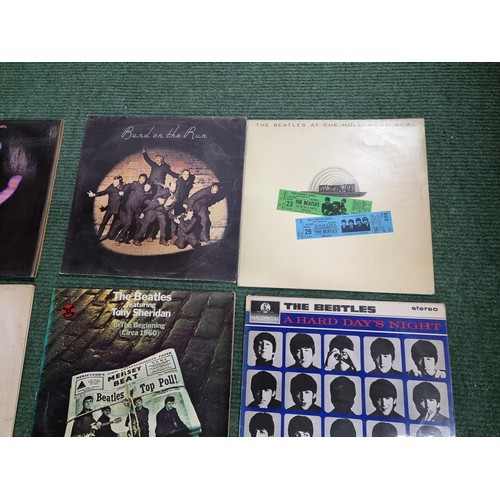 26 - A large collection of 16x vintage LP vinyl records all relating to The Beatles. To include 12 offici... 