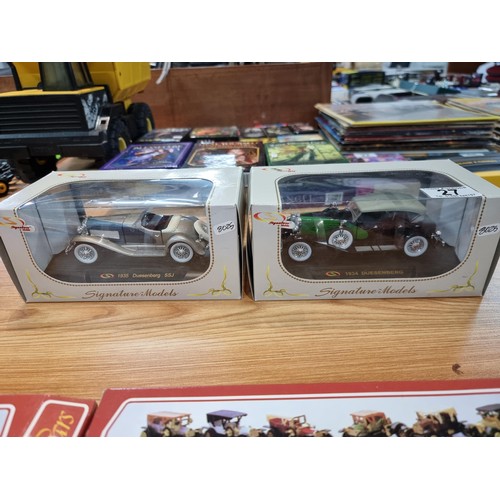 27 - A quantity of diecast vehicles including 2 boxed signature models vintage diecast cars along with 3 ... 