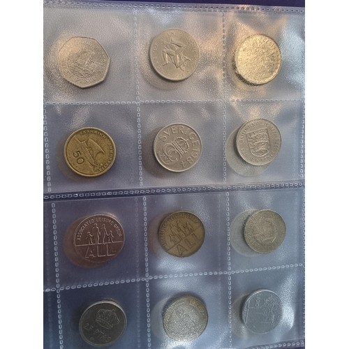 29 - A comprehensive coin album full of various world coins along with an as new handy fold flat fabricat... 