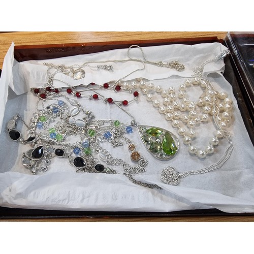 30 - A large collection of various costume jewellery including many matching sets along with boxed semi p... 