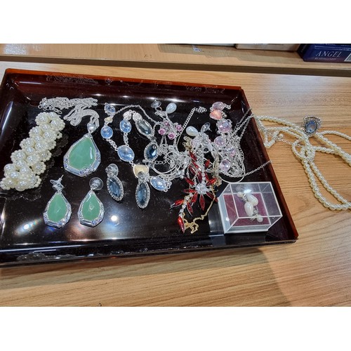 30 - A large collection of various costume jewellery including many matching sets along with boxed semi p... 