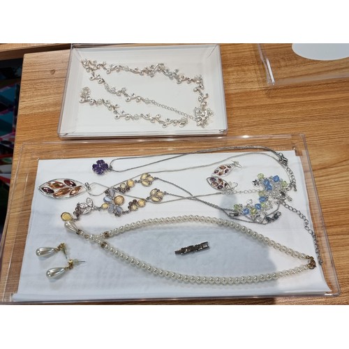 30 - A large collection of various costume jewellery including many matching sets along with boxed semi p... 