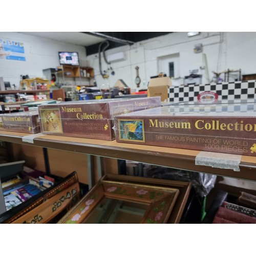 33 - A collection of 6x new and sealed museum collection puzzles 1000-1500 pieces, all still sealed in ce... 