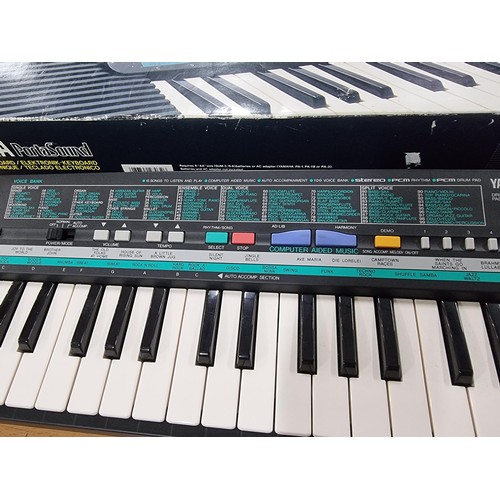 35 - A boxed Yamaha Portasound PSS-190 portable mini keyboard, battery powered. includes PSU but works on... 