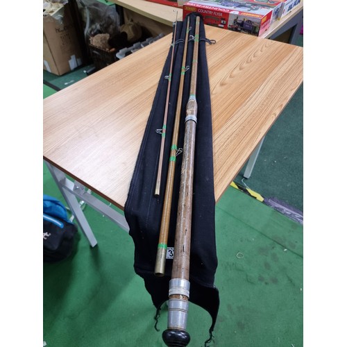 37 - A good quality vintage 3 piece fishing rod with its fabric case, in excellent clean condition.