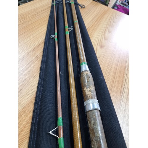 37 - A good quality vintage 3 piece fishing rod with its fabric case, in excellent clean condition.