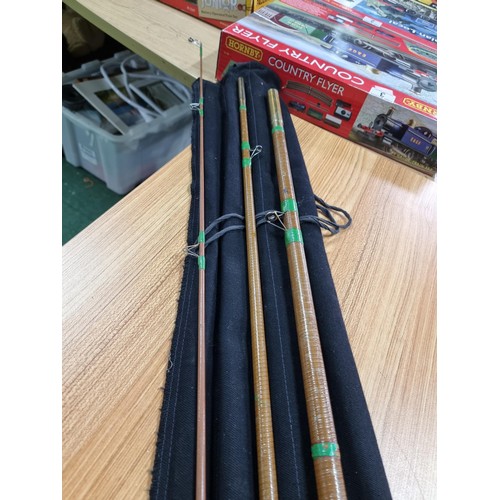 37 - A good quality vintage 3 piece fishing rod with its fabric case, in excellent clean condition.