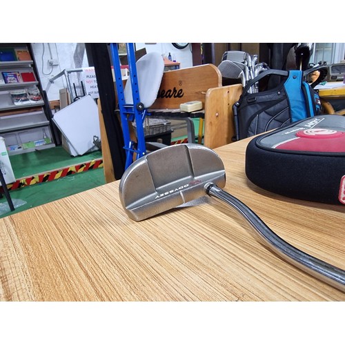 42 - A good quality right handed golf putter by Odyssey dual force 2, in good condition.