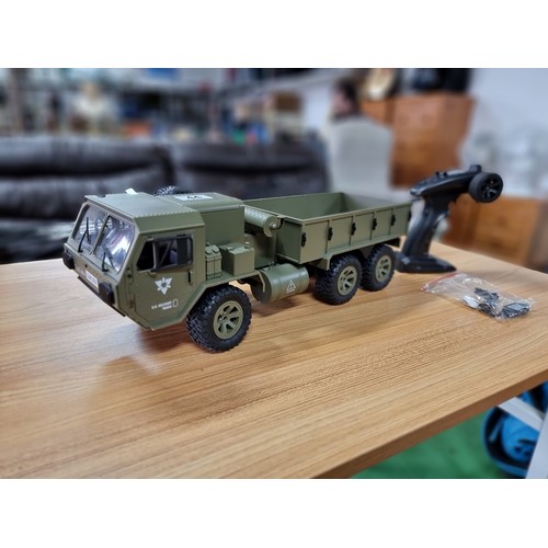 44 - A large GoolRC fayee remote control military truck. 1/12 scale, 6 wheel drive, in excellent conditio... 