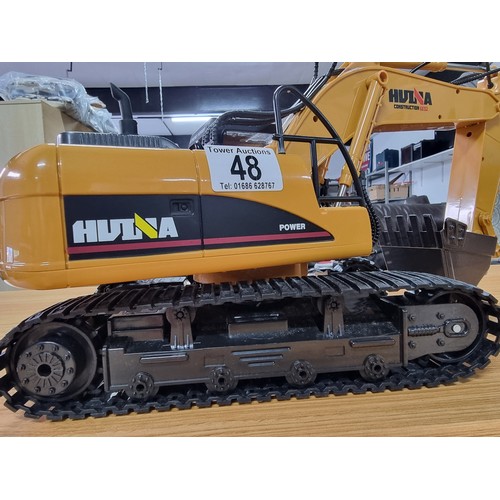 48 - A good quality diecast RC excavator digger by Hulna, very well looked after in as new condition, ful... 