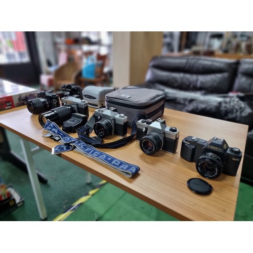 53 - A large collection of 6 various vintage 35mm cameras plus a Polaroid camera. All in full working ord... 