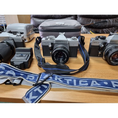 53 - A large collection of 6 various vintage 35mm cameras plus a Polaroid camera. All in full working ord... 