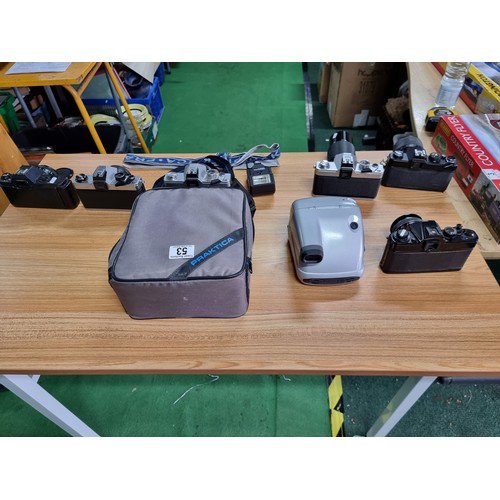 53 - A large collection of 6 various vintage 35mm cameras plus a Polaroid camera. All in full working ord... 