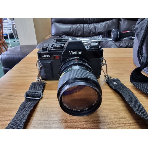 56 - A cased vintage Vivitar V635 camera with a Vivitar 28-70mm lens along with a Clubman 80-200mm lens w... 