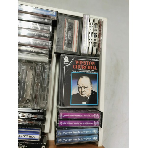 138 - Large collection of vintage cassettes inc Status Quo, Chris Rea, Brenda Lee etc along with a Murphy ... 