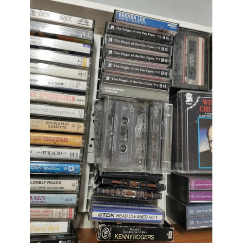 138 - Large collection of vintage cassettes inc Status Quo, Chris Rea, Brenda Lee etc along with a Murphy ... 