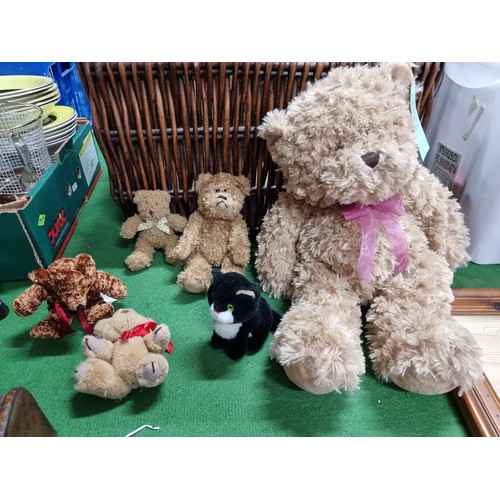 65 - A box of collectable odds and a good wicker basket full of various teddies. To include a box of deco... 