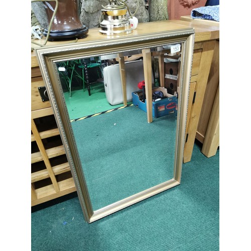 153 - Large gilt framed mirror, in good order 3ft x 2ft approx.