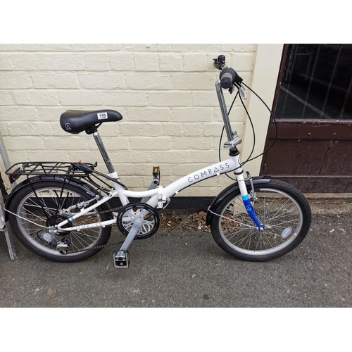 159 - Compass fold up road bike complete with lock and key, in good order 6 speed, folds flat for ease of ... 