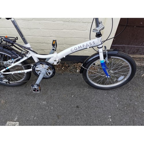 159 - Compass fold up road bike complete with lock and key, in good order 6 speed, folds flat for ease of ... 