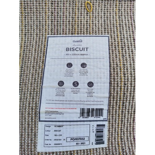 164 - Dunelm  biscuit colored rug in good order deep pile measure 160 cm x 230xm