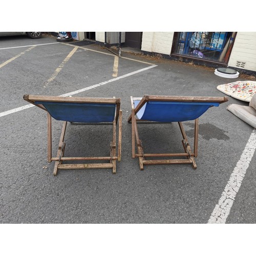 168 - A pair of vintage deck chairs in good order