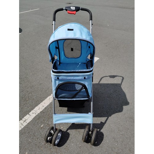 169 - Pale blue foldable dog / cat pram, in good order folds flat for ease of storage