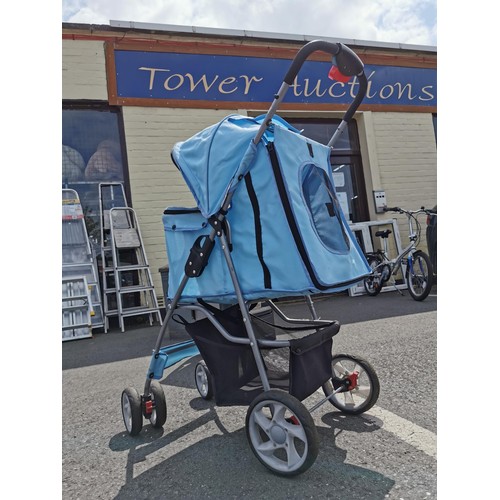 169 - Pale blue foldable dog / cat pram, in good order folds flat for ease of storage