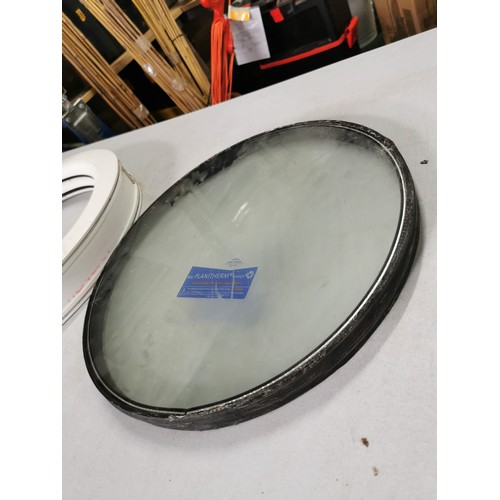 171 - Round double glazed UPVC window along with a Argon filled double glazed round window, frame has a di... 