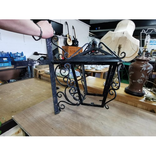 176 - Vintage wrought iron decorative wall corner light with scrolling to the edges in good order, require... 