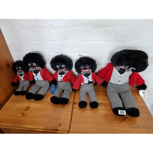 69 - A collection of 5 vintage collectable Robertson's golly soft toy rag dolls which include one 24